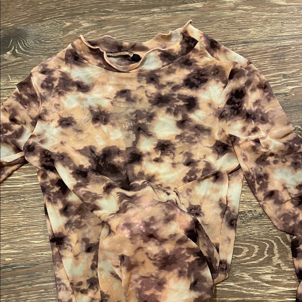 Sheer patterned mocneck top
